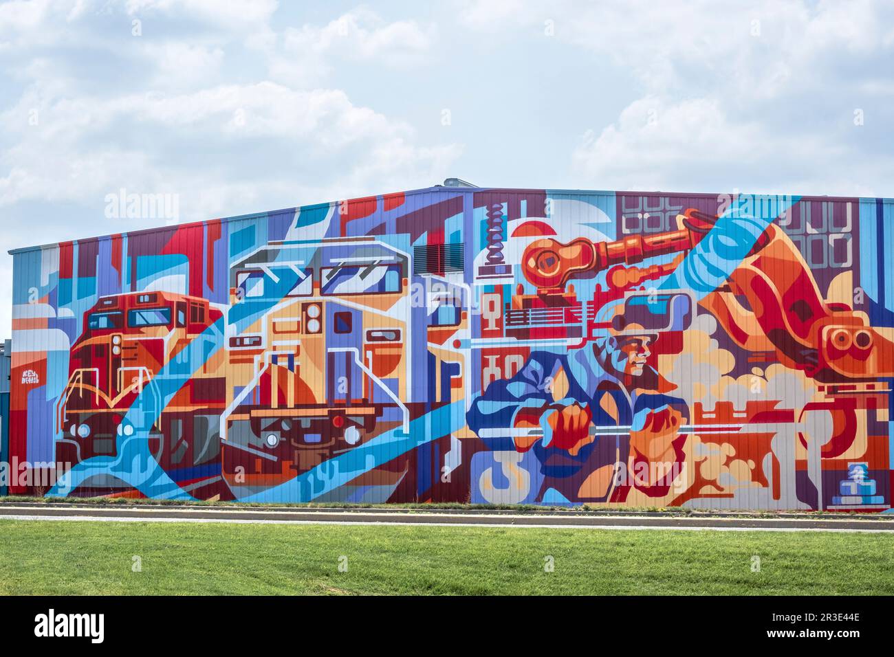 North Kansas City, Missouri, USA – farbenfrohe Wandmalerei zur Feier von Industriearbeitern Stockfoto