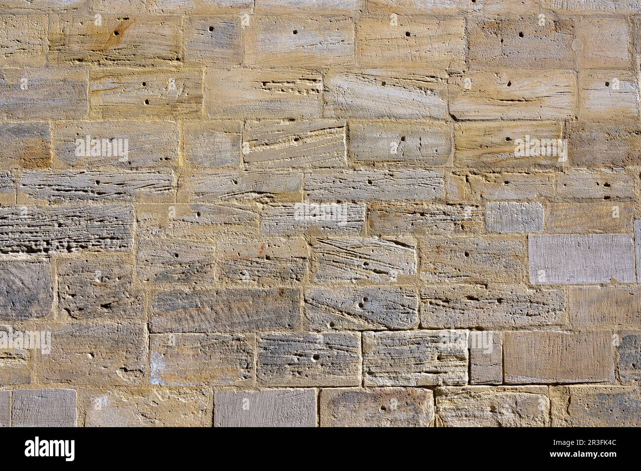 Hintergrund einer alten Mauer aus Naturstein Stockfoto
