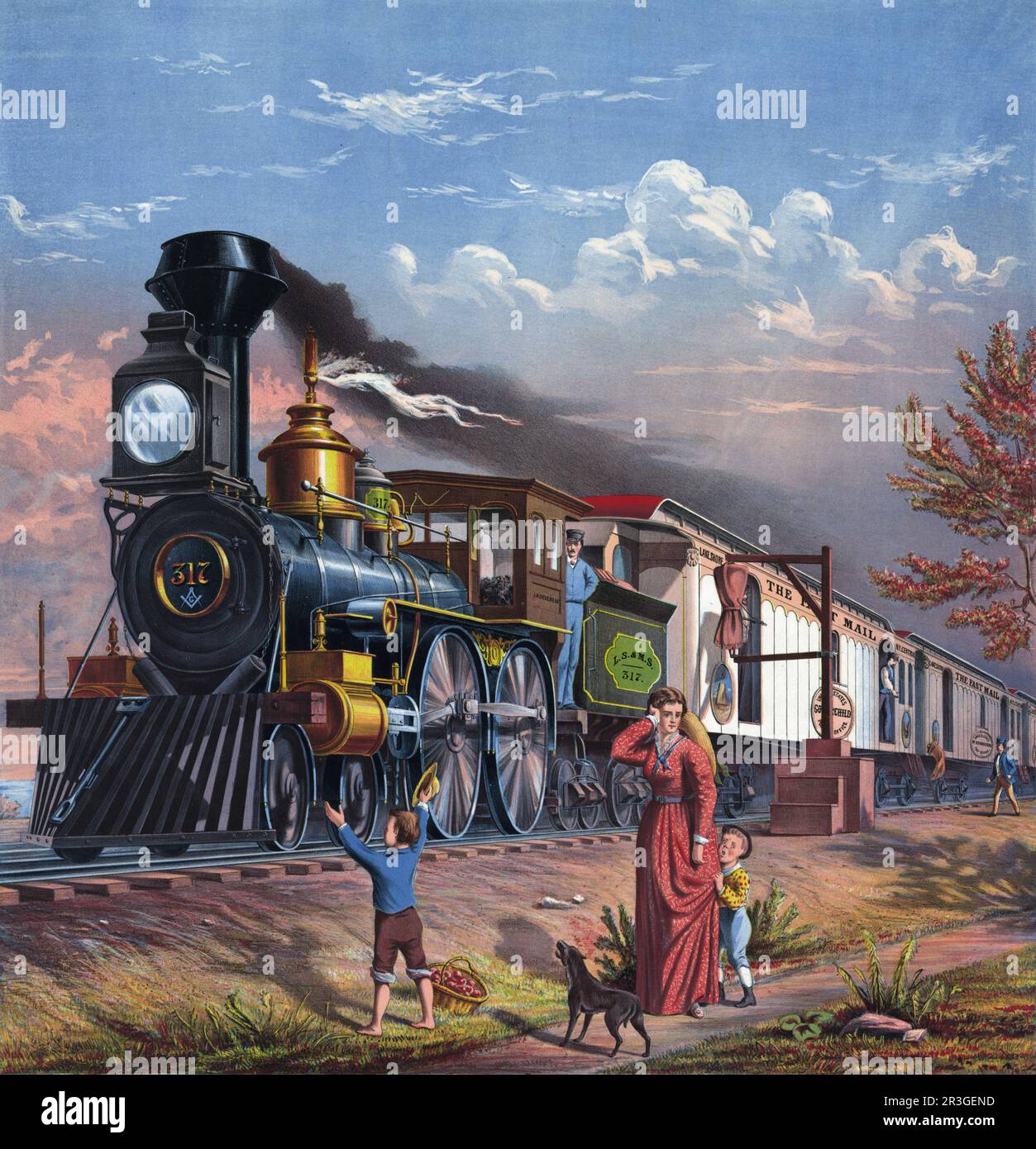 Eine Frau und zwei Jungs, die zusehen, wie eine Dampflokomotive vorbeifährt, um Post zu liefern und zu empfangen. Stockfoto