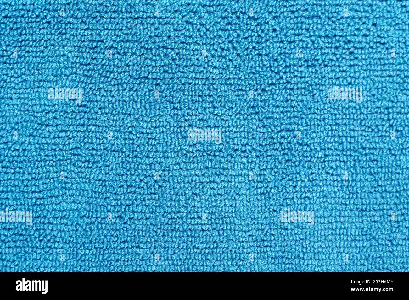 Mikrofasertuch mit Nahaufnahme. Textilhintergrund. Blaues Stoffmuster. Reinigungsservice Stockfoto
