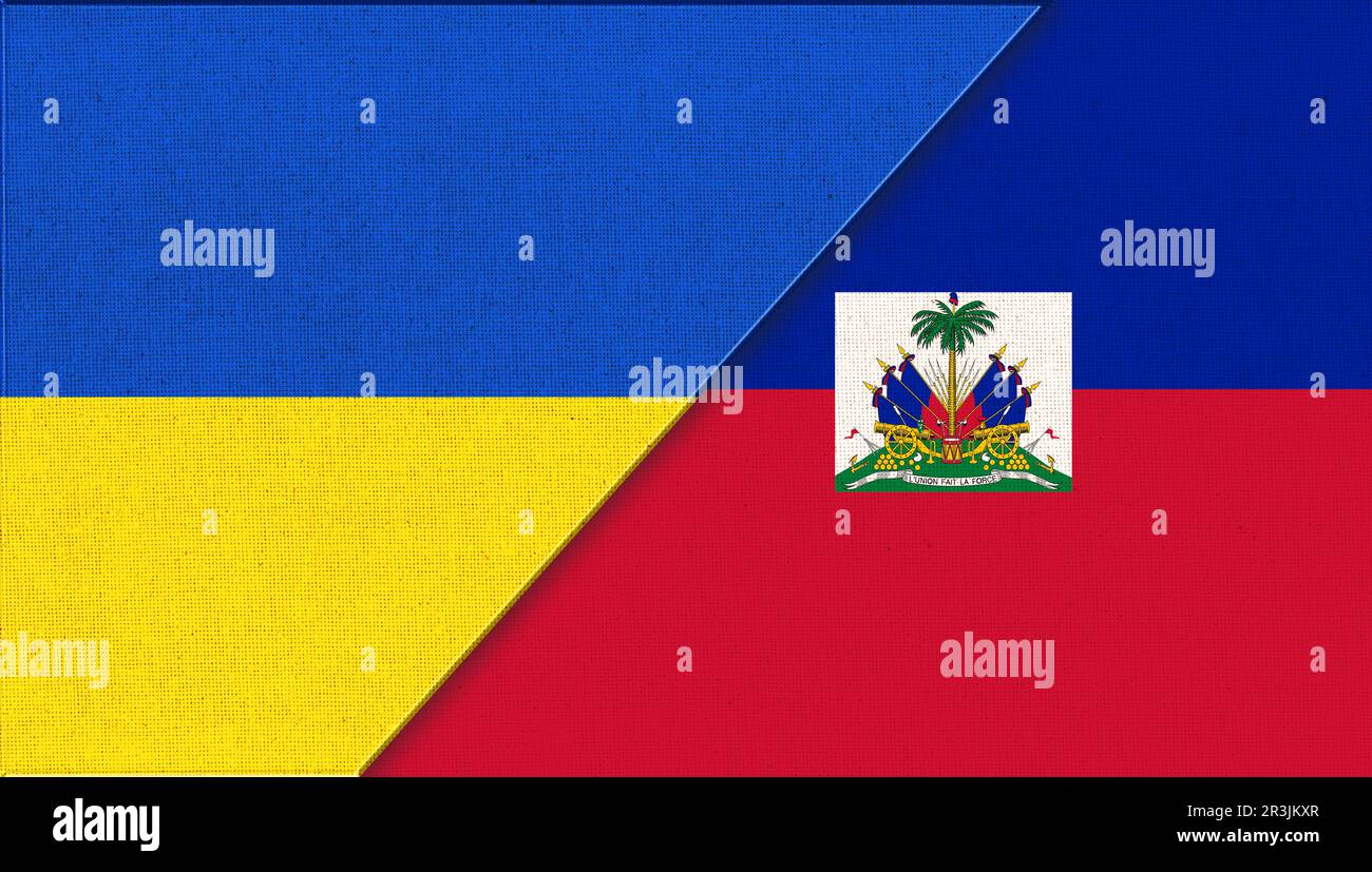 Flaggen der Ukraine und Haitis. Ukrainische und haitianische Flaggen auf Stoffoberfläche. Nationale Symbole. Stockfoto