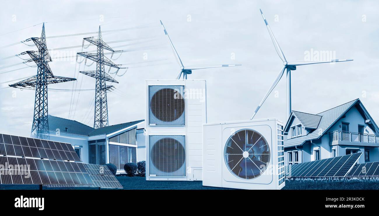 Wärmepumpen mit Häusern, Photovoltaik- und Windenergie für erneuerbare Energien Stockfoto