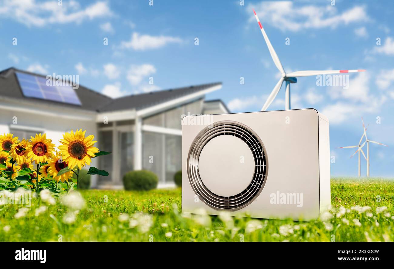 Wärmepumpe mit Haus-, Photovoltaik- und Windenergie für erneuerbare Energien Stockfoto
