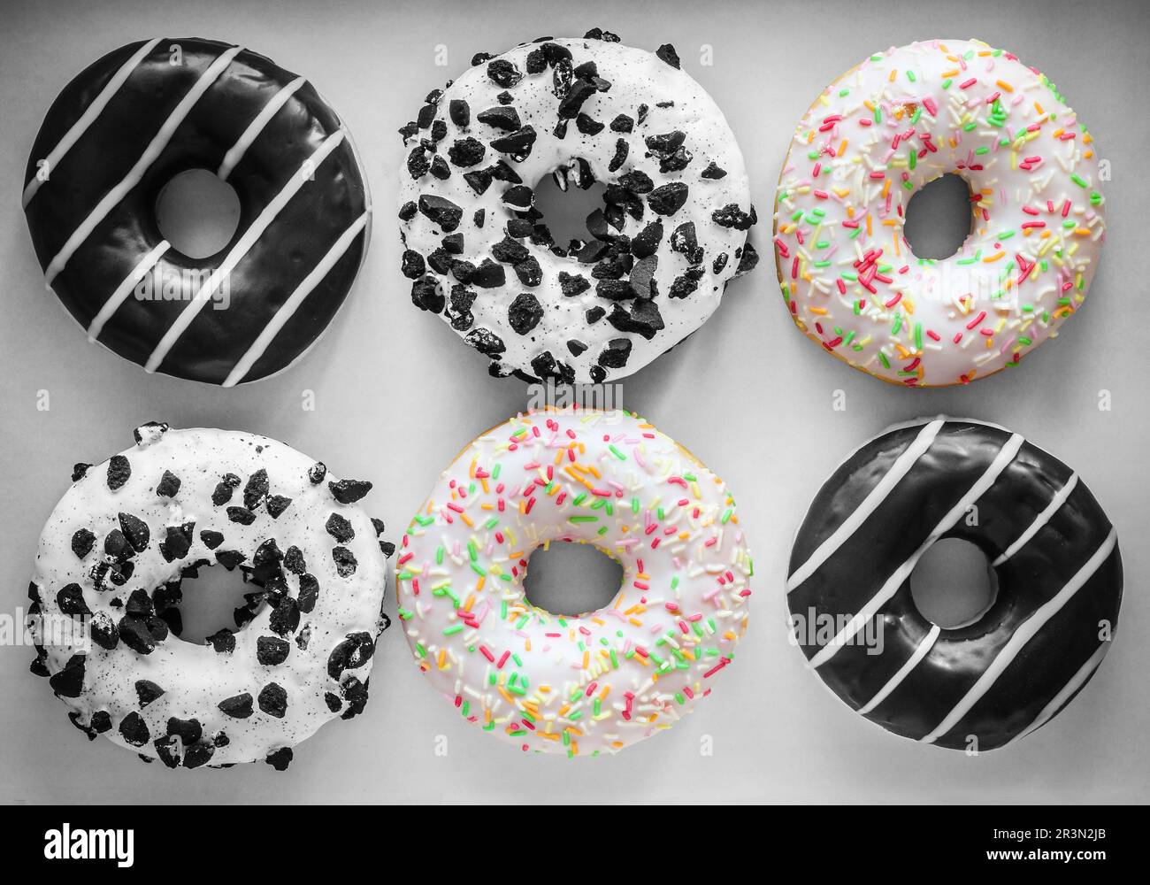 Sechs Ringdonuts mit unterschiedlicher Glasur Stockfoto
