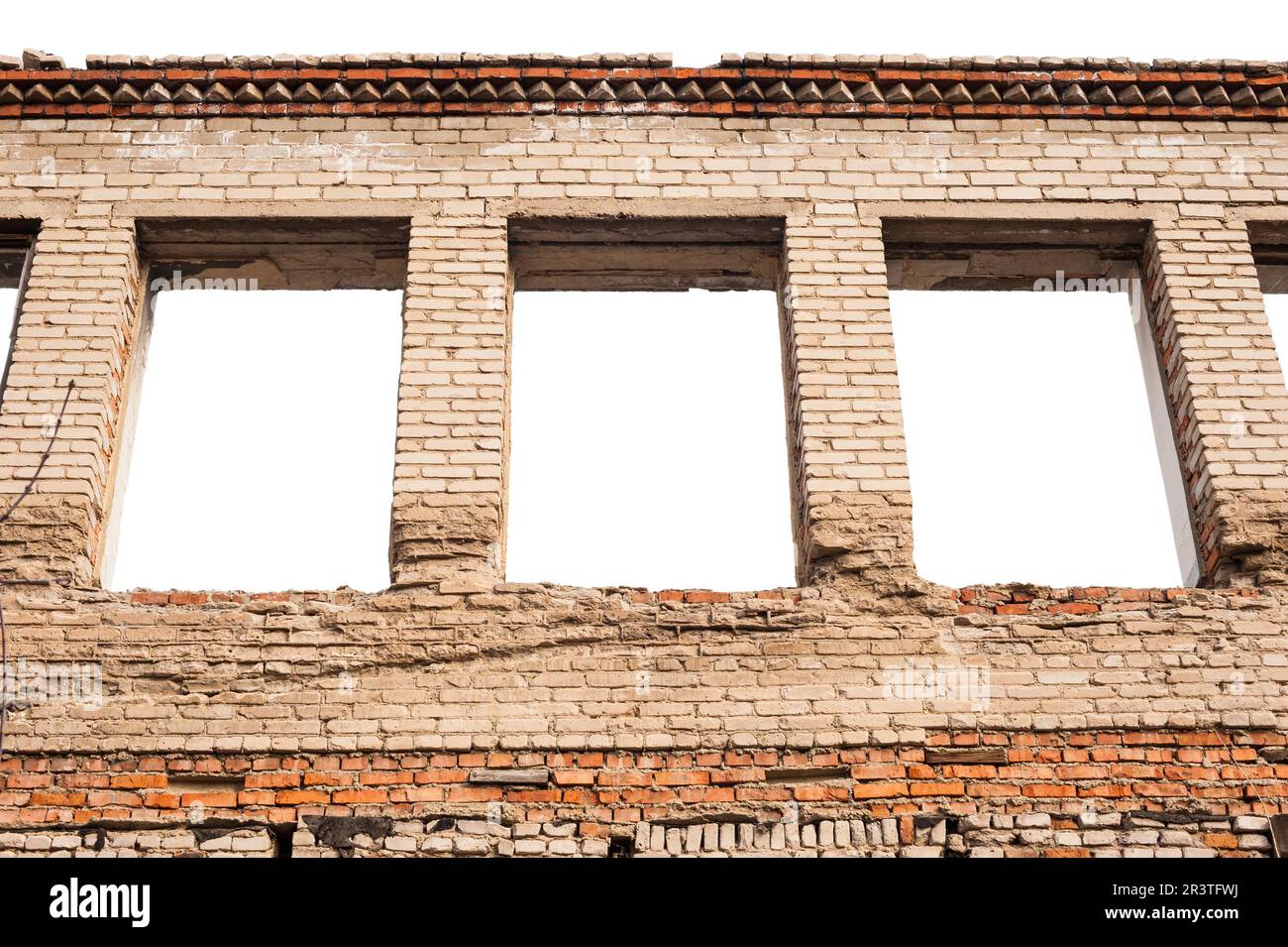 Leere Fensteröffnungen in der Ziegelwand Stockfoto