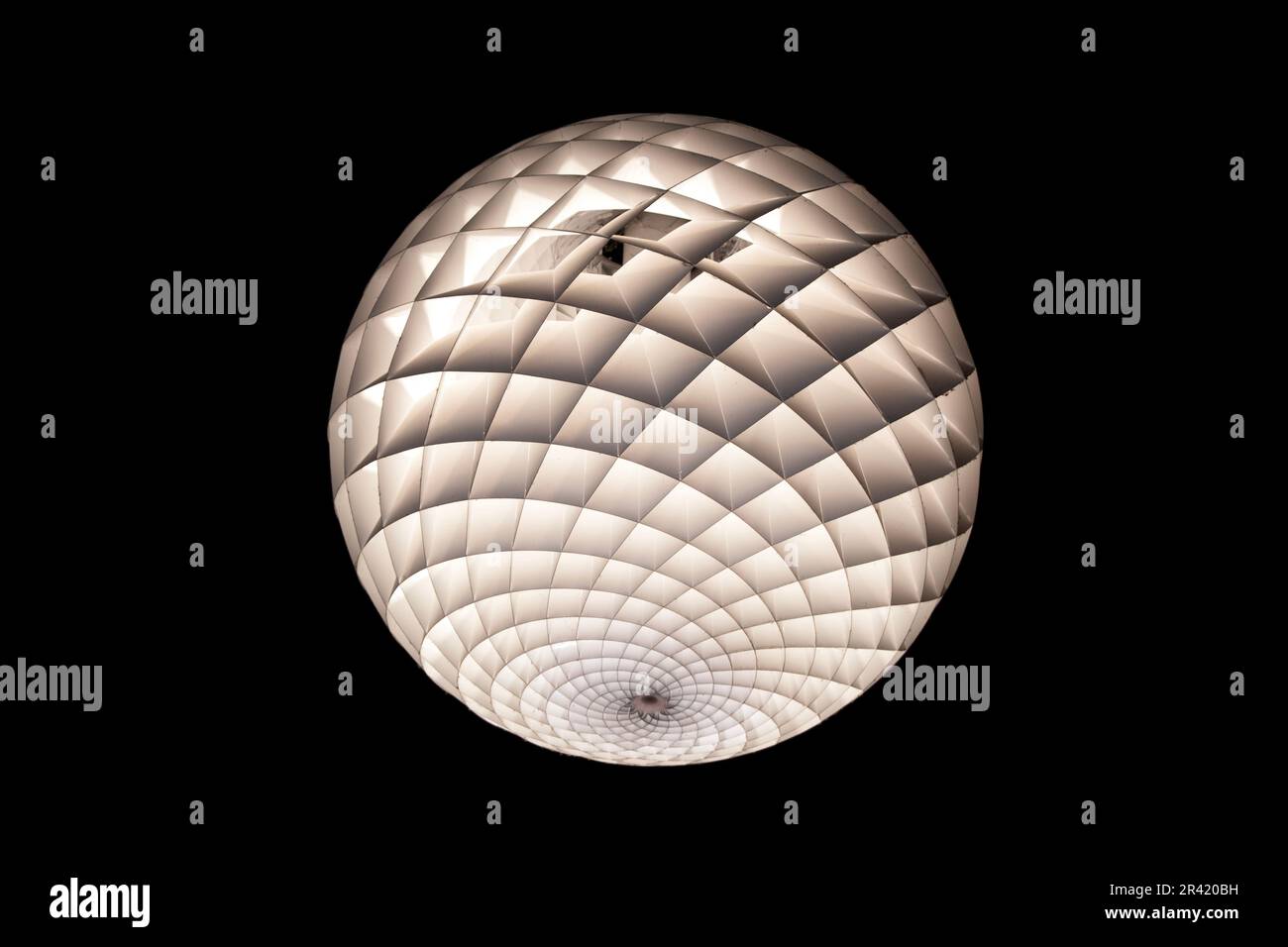 Abstrakte beleuchtete Kugel mit geometrischem Muster Stockfoto