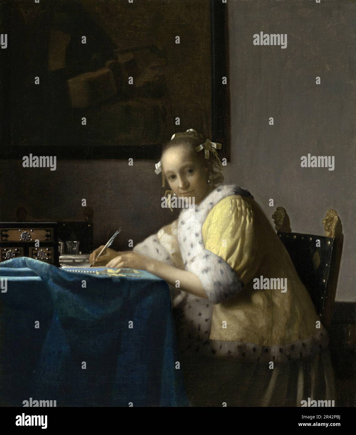 Eine Frau, die 1665 vom niederländischen Maler des Goldenen Zeitalters Johannes Vermeer gemalt wurde Stockfoto