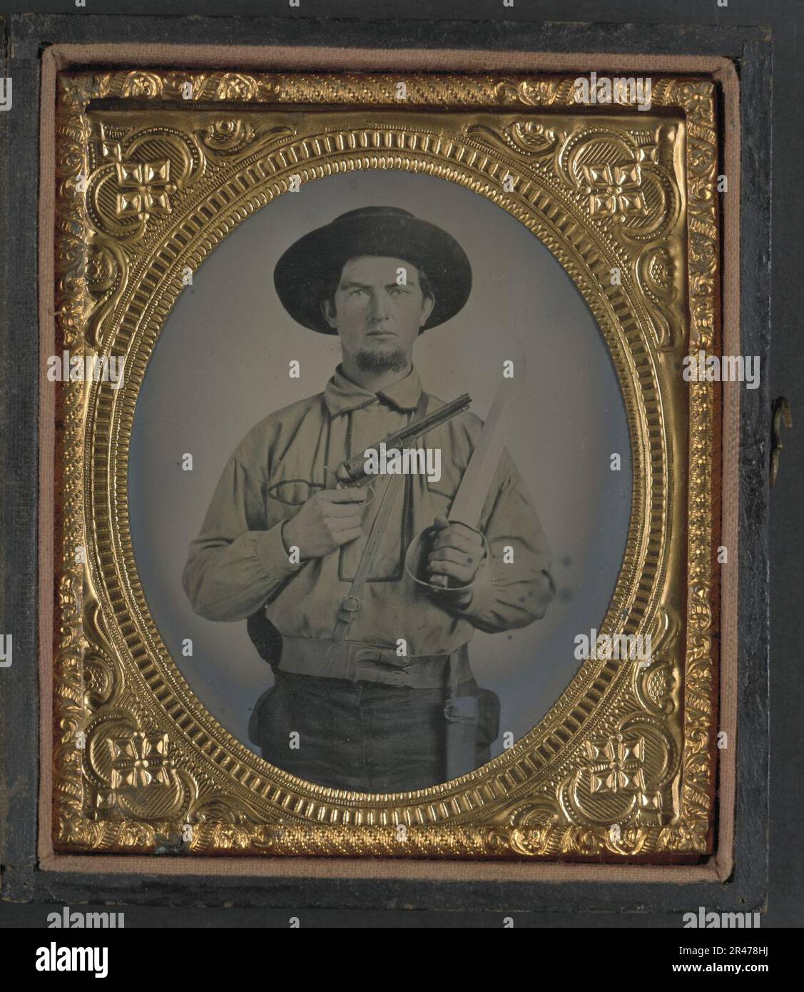 Unbekannter Soldat in Confederate Uniform mit Colt Navy Revolver und Doppel griff D-Guard Bowie Messer Stockfoto