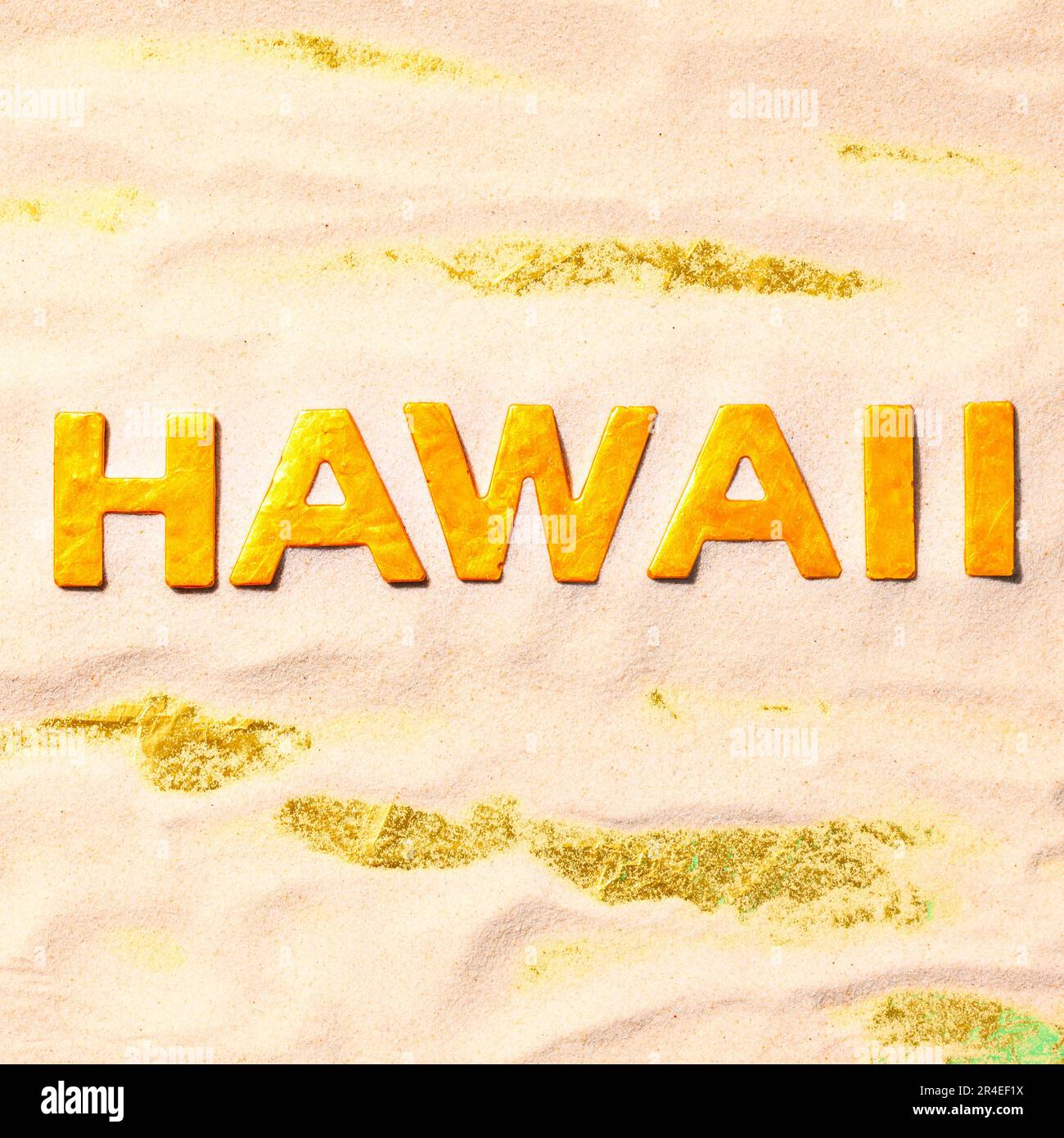 Hawaii - Goldene Buchstaben im weißen Sand Stockfoto
