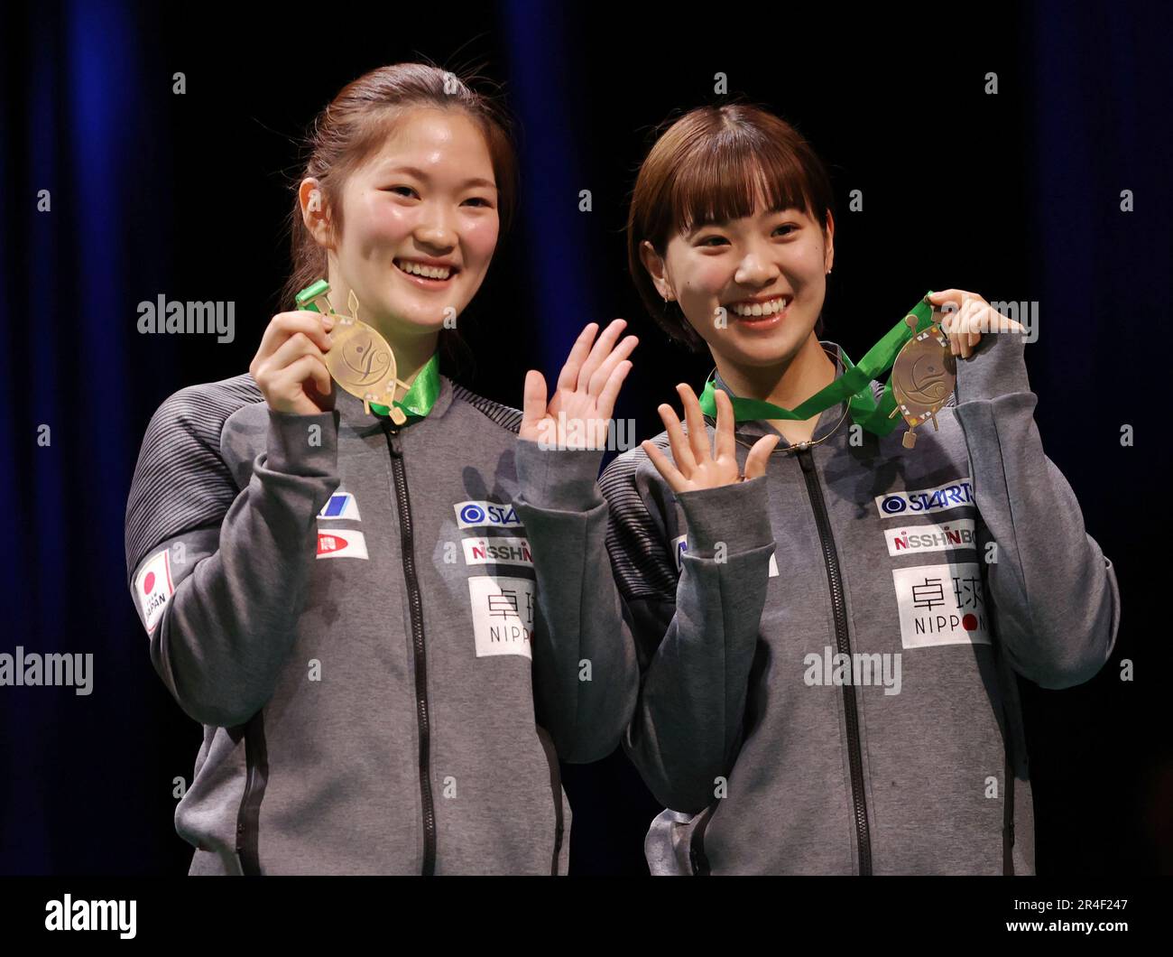 Miyuu Kihara and Miyu Nagasaki of Japan celebrate during an award