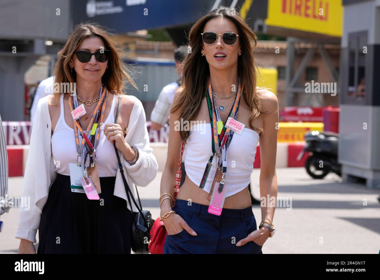 Italian model Alessandra Ambrosio, right, walks near the track prior to
