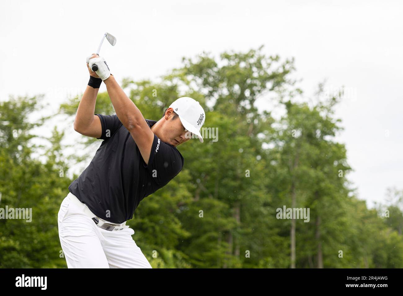 Danny Lee of Iron Heads GC hits his shot on the driving range during