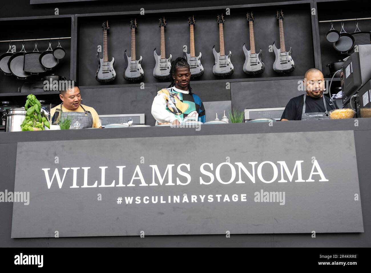 Chris Ying, left, Lil Nas X, and David Chang are seen day three of the