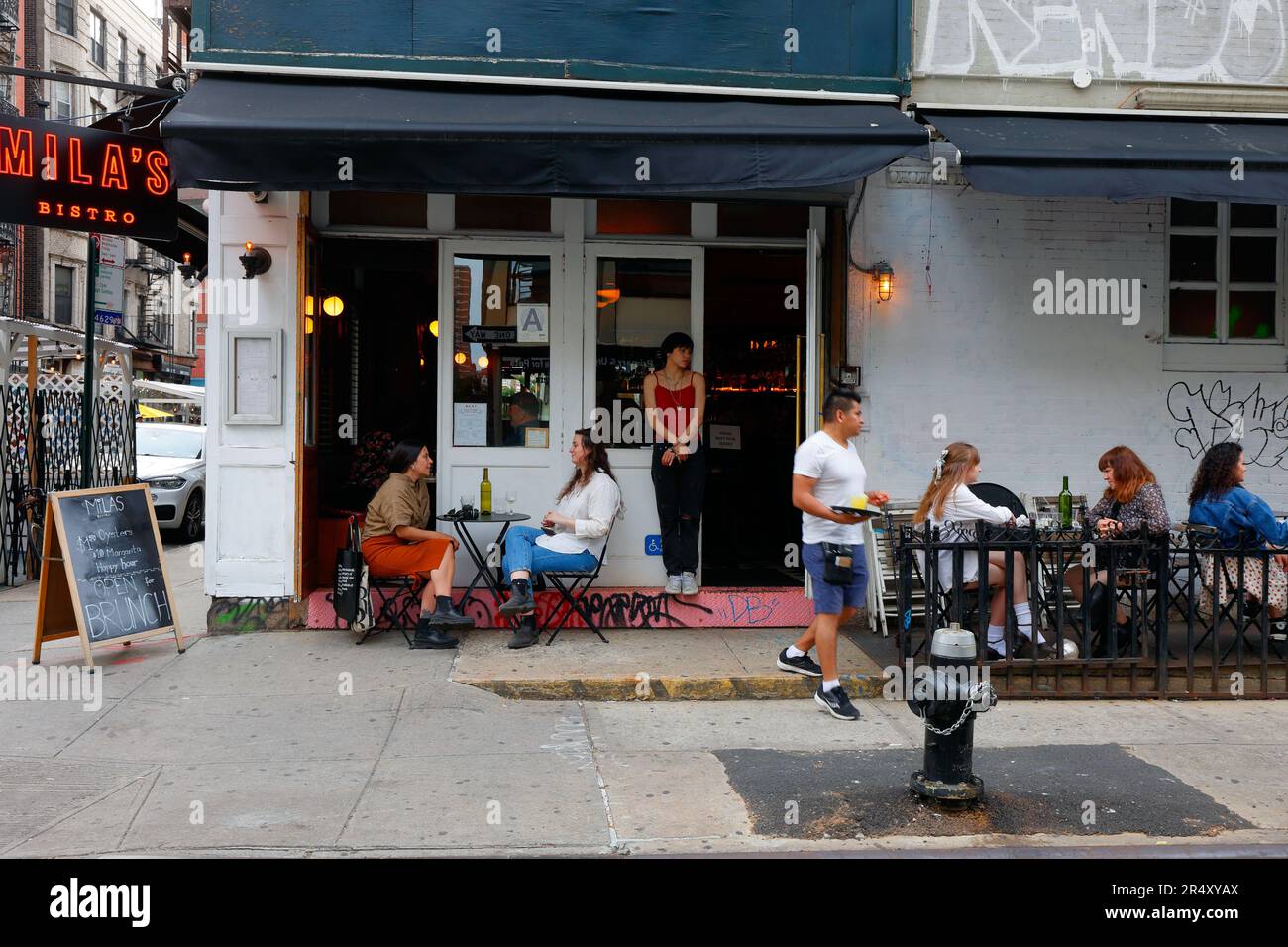 Mila's Bistro, 81 Ludlow St, New York, NYC, Foto eines Restaurants in Manhattans Lower East Side-Viertel. Stockfoto