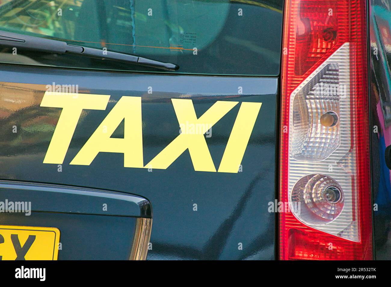 Taxi-Schild auf dem hinteren pf-Taxi Stockfoto