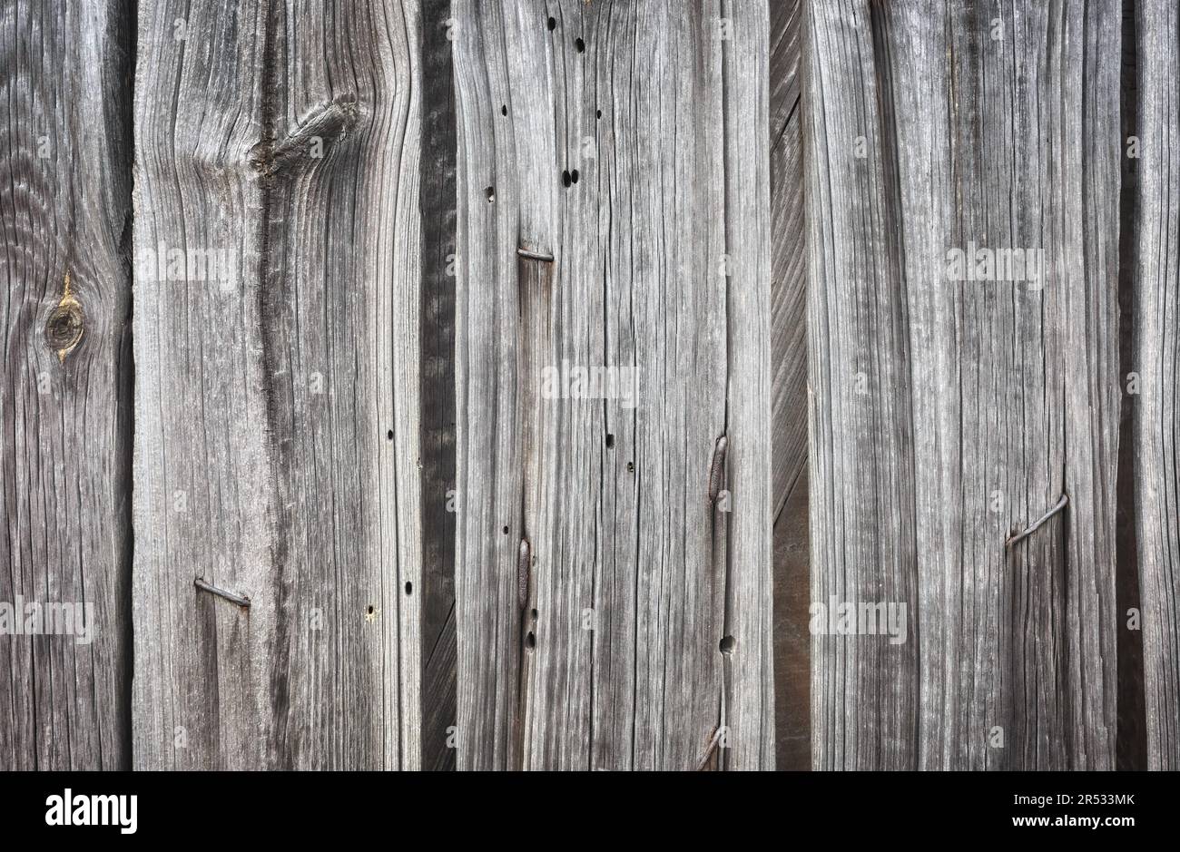Nahaufnahme einer alten Holztür, eines Hintergrunds oder einer Tapete. Stockfoto