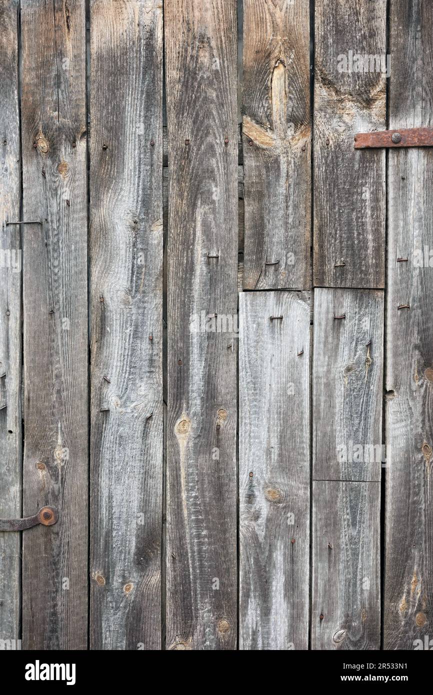Nahaufnahme einer alten Holztür, eines Hintergrunds oder einer Tapete. Stockfoto