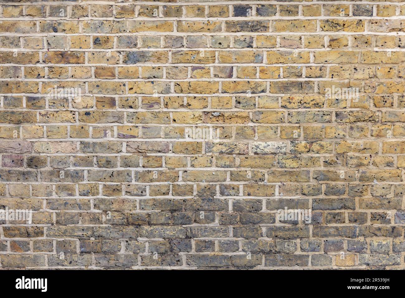 Alte verwitterte Ziegelwandtextur. Grunge Stadtmauern Stockfoto