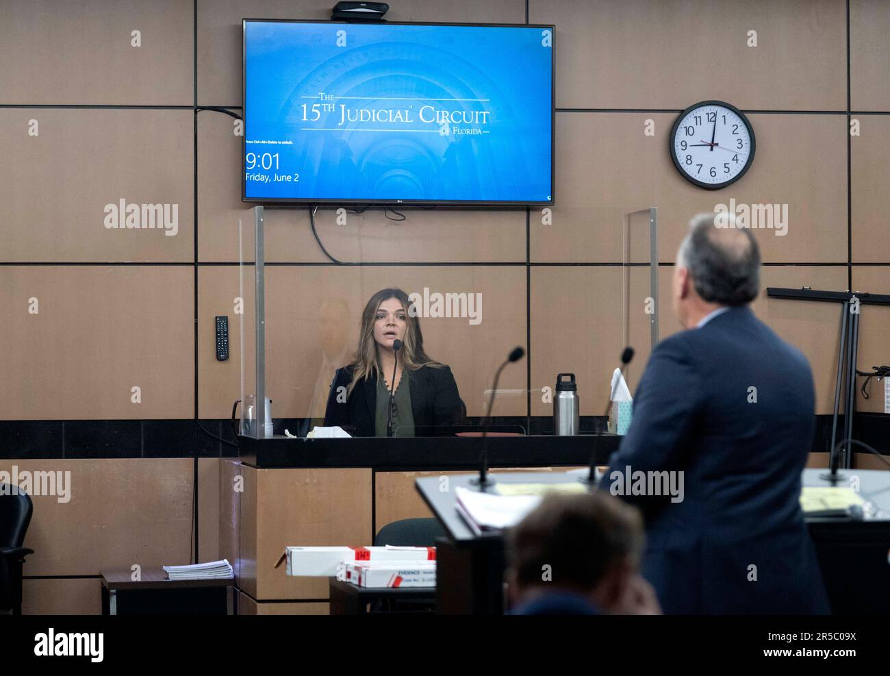 Det. Emily Vander-Laan answers questions from defense attorney Marc