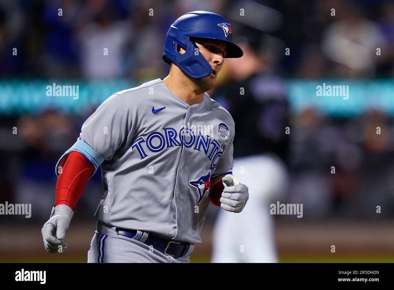 Toronto Blue Jays' Daulton Varsho runs the bases after hitting a two