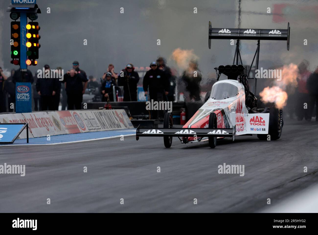 EPPING, NH JUNE 03 Doug Kalitta takes off in his Top Fuel Dragster