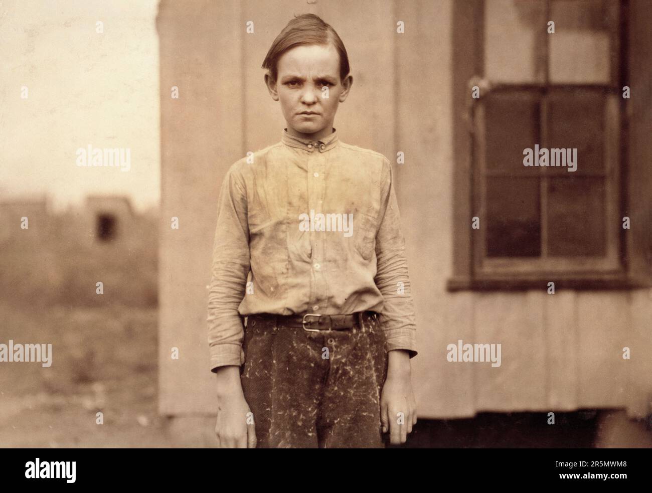 Charlie Lott, 13 Jahre alt, Doffer in Baumwollfabrik, West, Texas, USA, Lewis Wickes Hine, November 1913 Stockfoto