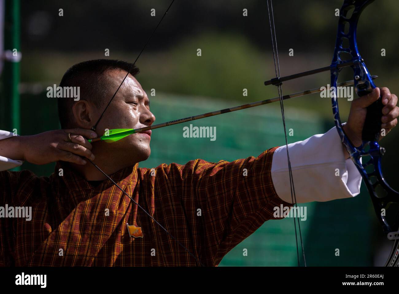 Bogenschießen-Wettbewerb in Thimphu, Bhutan. Bogenschießen ist der Nationalsport des Königreichs. Stockfoto