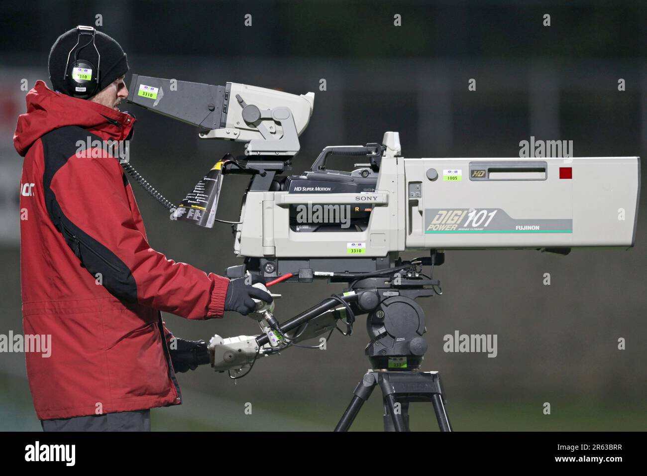 Ein Fernsehkameramann berichtet über eine Sportveranstaltung in Auckland, Neuseeland Stockfoto