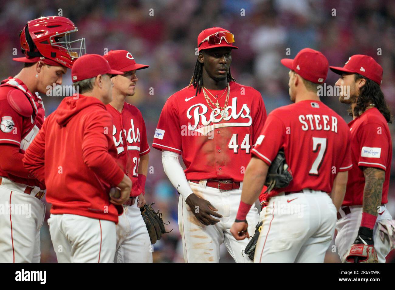 Cincinnati Reds, from left to right, Tyler Stephenson, David Bell