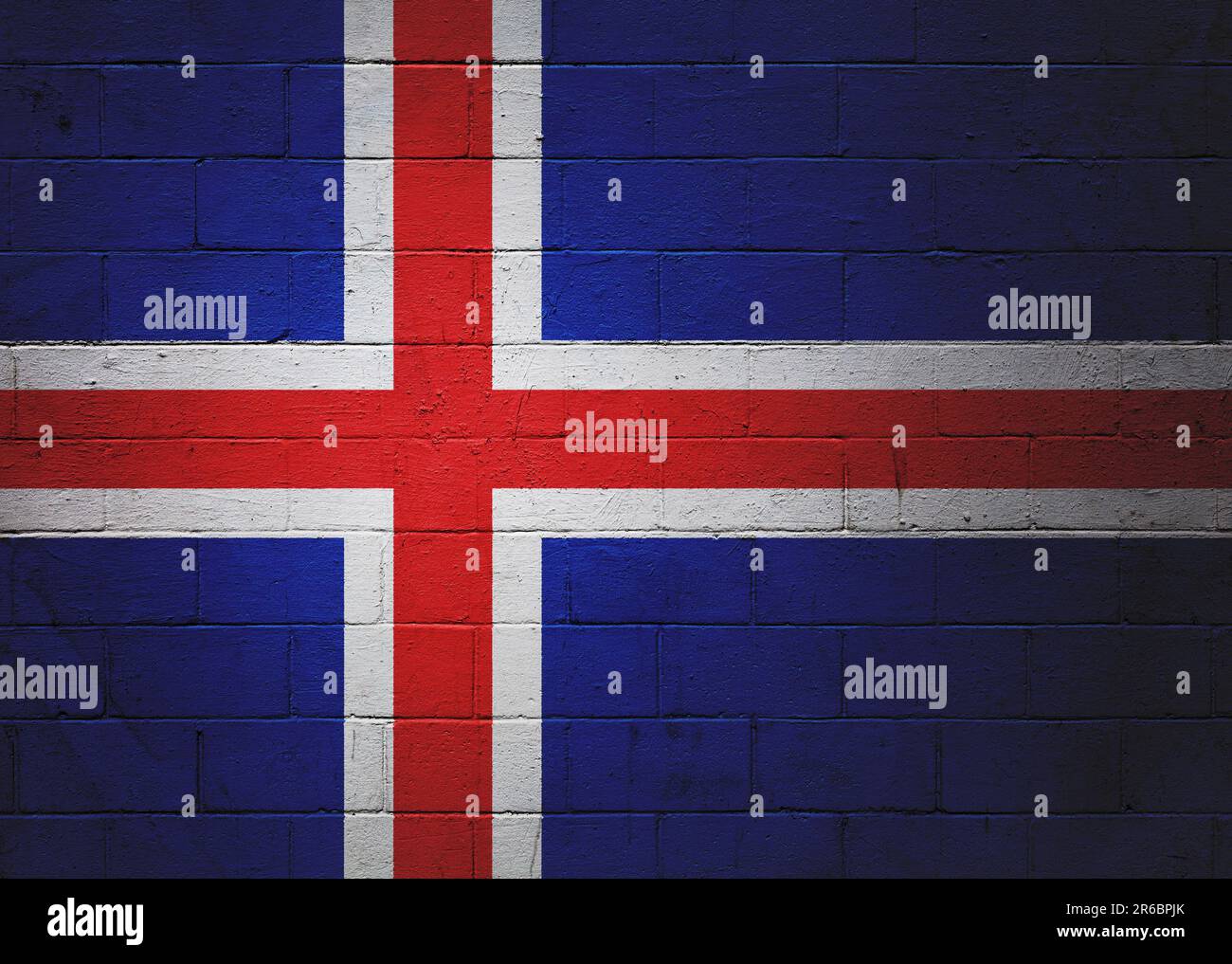 Die Flagge Islands ist an einer Ziegelwand gemalt. Stockfoto