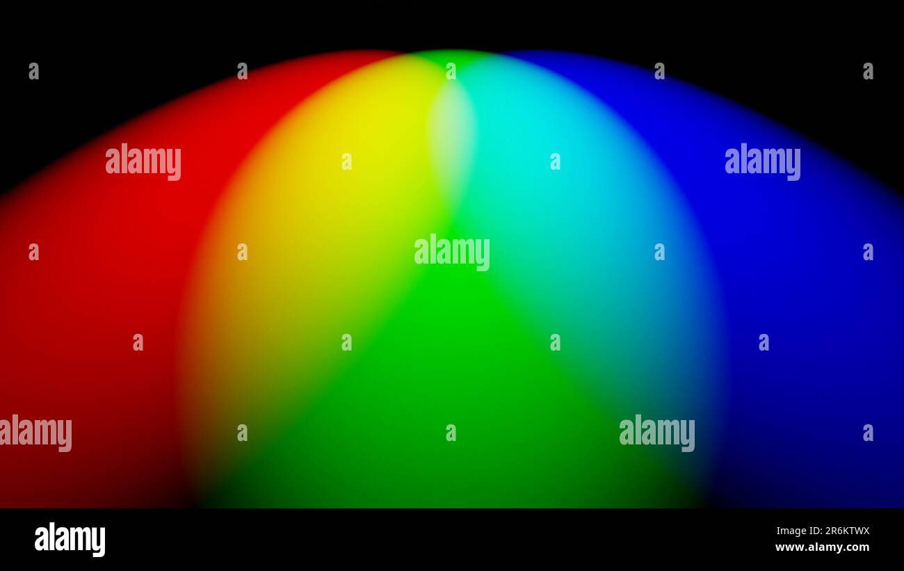 RGB-Spotlicht auf einem dunklen Hintergrund, das eine Farbe mischt Stockfoto