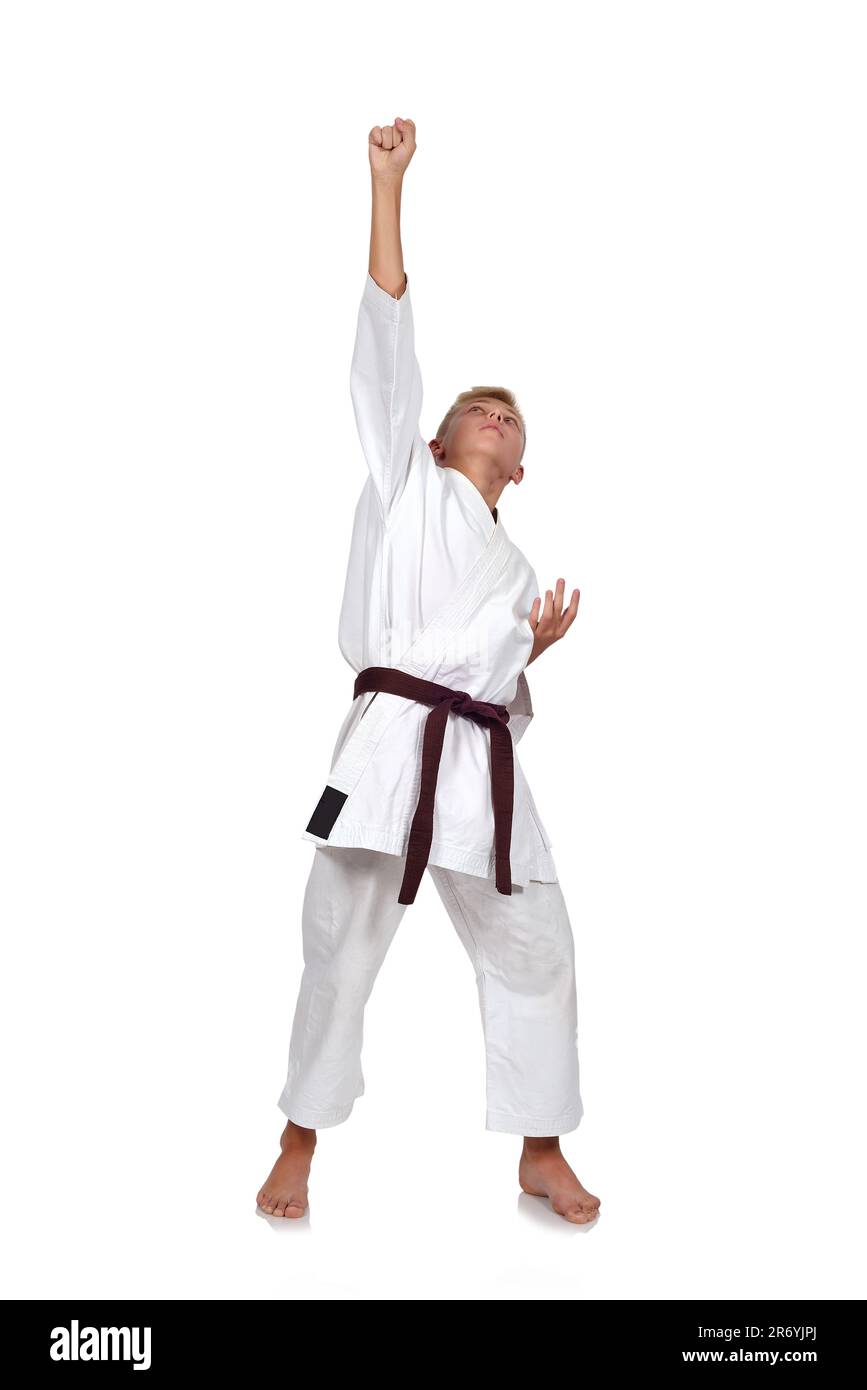 Sieger-Karate-junge isoliert auf weißem Hintergrund Stockfoto