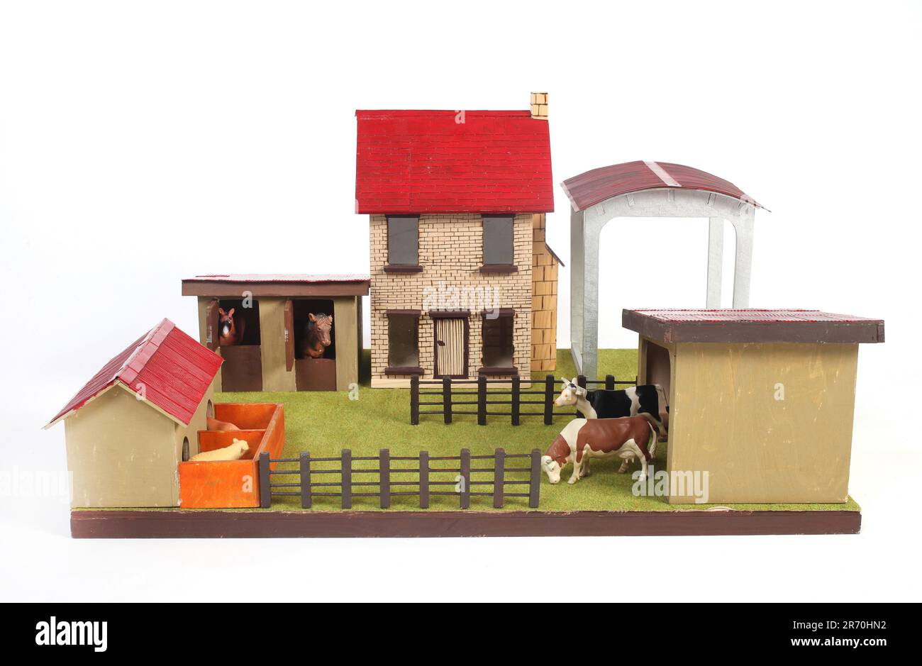 Ein hölzernes Bauernhofspielzeug mit Tieren Stockfoto