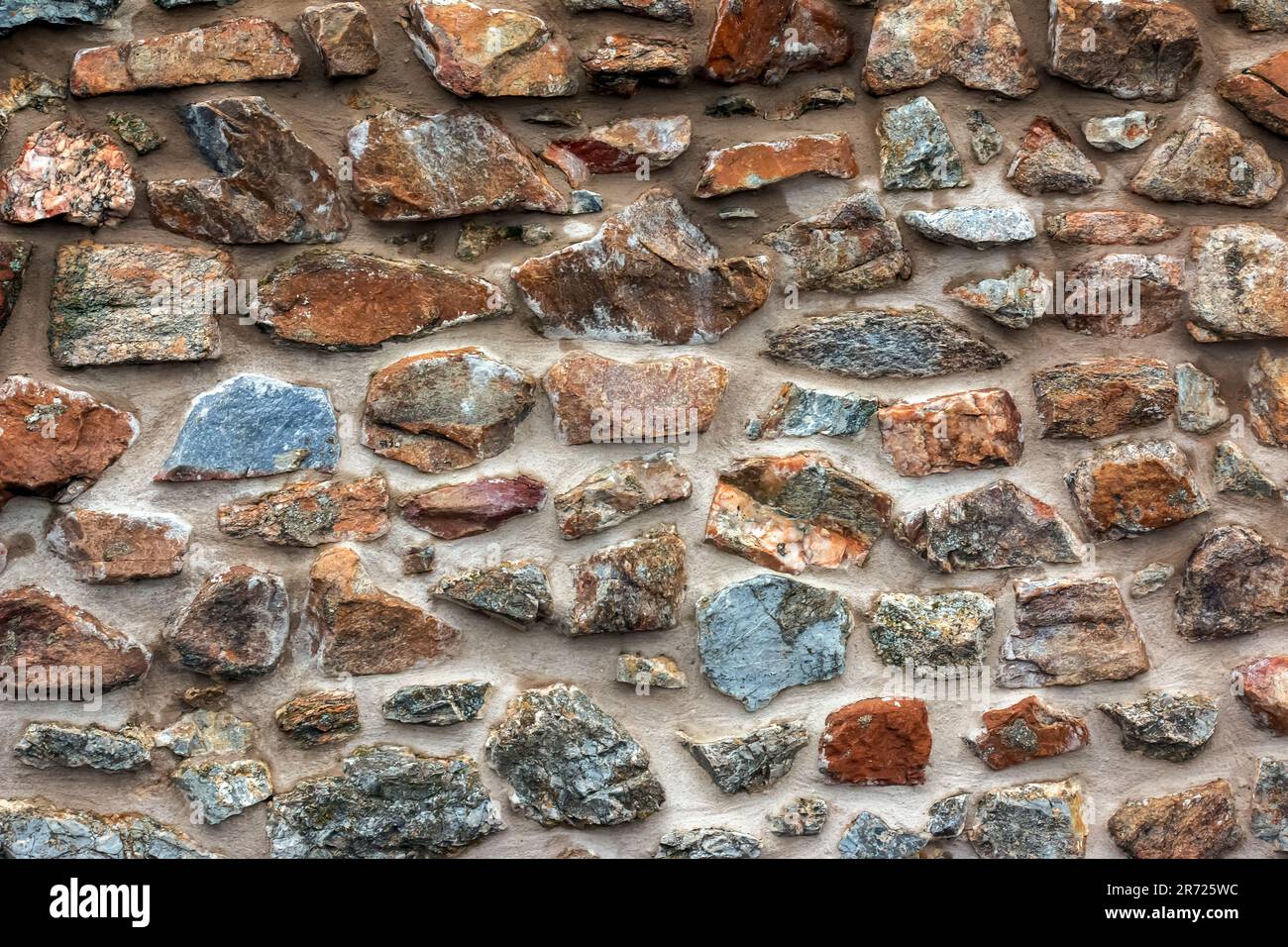 Die Konsistenz der Steinwand. Hintergrundstruktur der Steinmauer der alten Burg. Steinwand als Hintergrund oder Textur. Stockfoto Die Konsistenz der Steinwand. Hintergrundstruktur der Steinmauer der alten Burg. Steinwand als Hintergrund oder Textur. Stockfoto