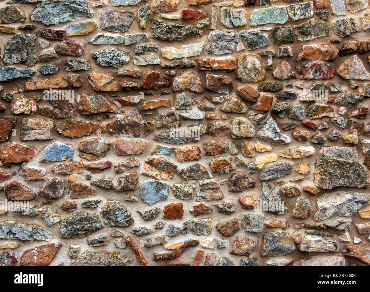 Die Konsistenz der Steinwand. Hintergrundstruktur der Steinmauer der alten Burg. Steinwand als Hintergrund oder Textur. Stockfoto Die Konsistenz der Steinwand. Hintergrundstruktur der Steinmauer der alten Burg. Steinwand als Hintergrund oder Textur. Stockfoto