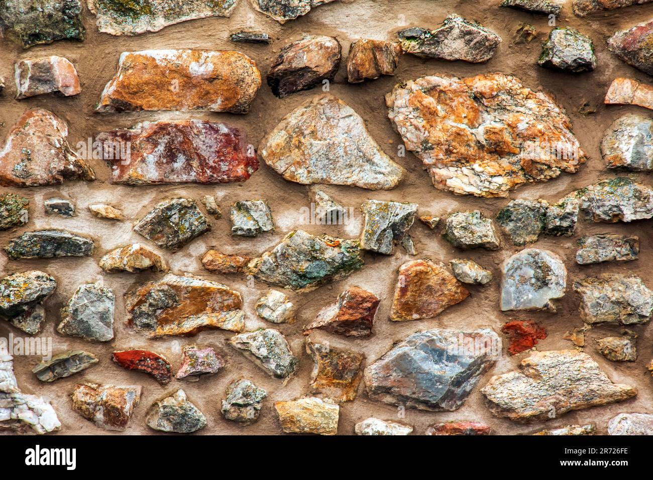 Die Konsistenz der Steinwand. Hintergrundstruktur der Steinmauer der alten Burg. Steinwand als Hintergrund oder Textur. Stockfoto Die Konsistenz der Steinwand. Hintergrundstruktur der Steinmauer der alten Burg. Steinwand als Hintergrund oder Textur. Stockfoto