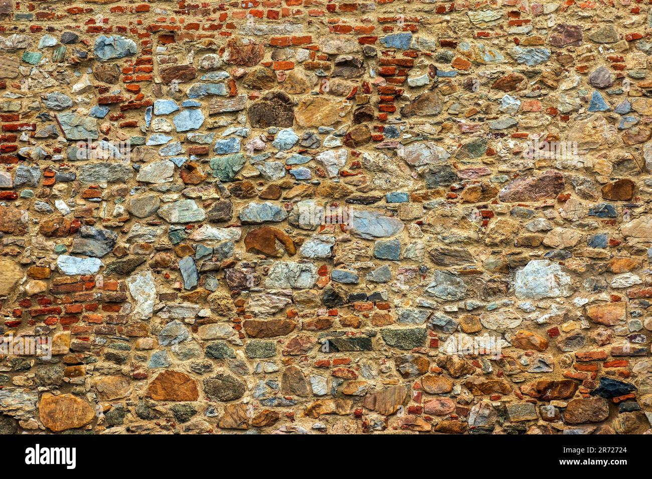 Die Konsistenz der Steinwand. Hintergrundstruktur der Steinmauer der alten Burg. Steinwand als Hintergrund oder Textur. Stockfoto Die Konsistenz der Steinwand. Hintergrundstruktur der Steinmauer der alten Burg. Steinwand als Hintergrund oder Textur. Stockfoto