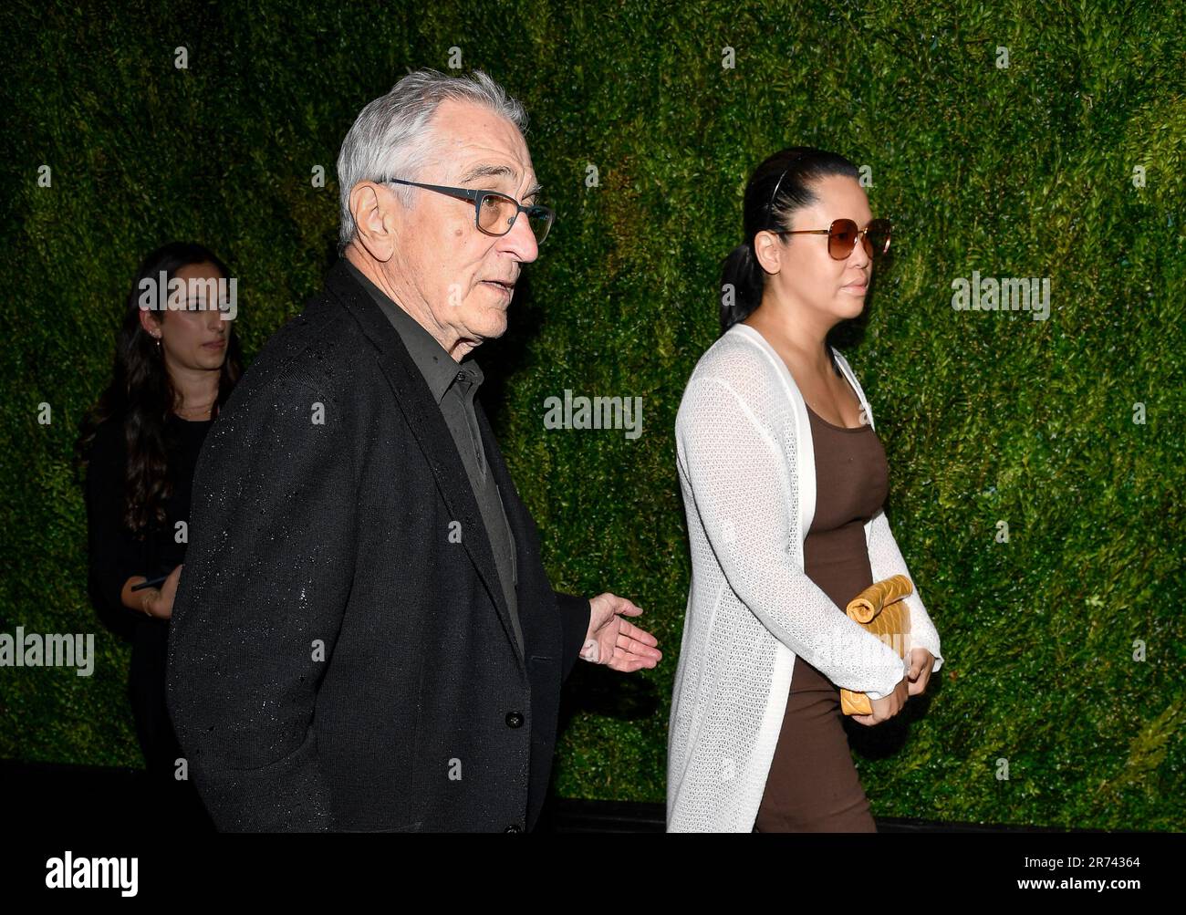 Robert De Niro, left, and Tiffany Chen arrive at the 16th annual Chanel