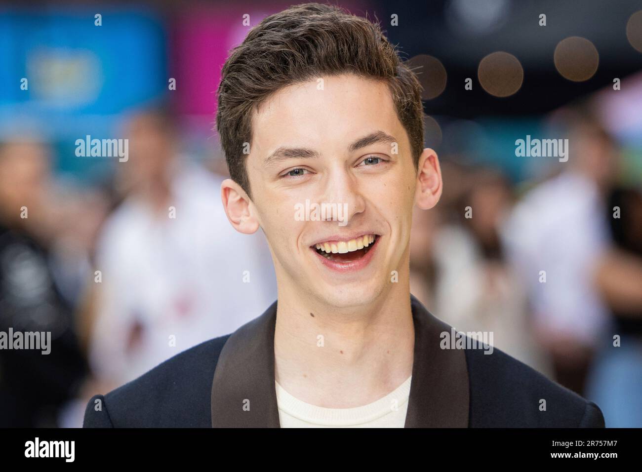 Andrew Barth Feldman poses for photographers upon arrival at the