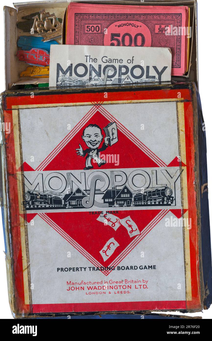 Vintage Monopoly Property Trading Board Game Trade Mark 711981 von John Waddington Ltd - Box geöffnet mit Anweisungen und Vintage Monopoly Geld Stockfoto