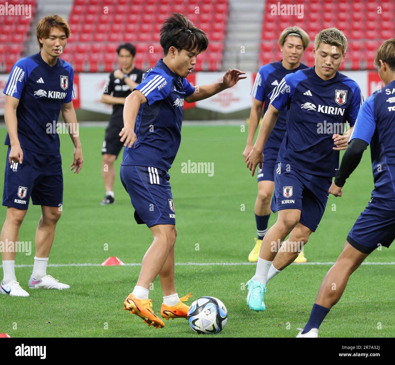 Japanese national football team, Samurai Blue's Takefusa Kubo (C) attends a practice session at Toyota Stadium in Aichi Prefecture on June 14, 2023. Japan will face El Salvador on the following day. ( The Yomiuri Shimbun via AP Images ) Stockfoto
