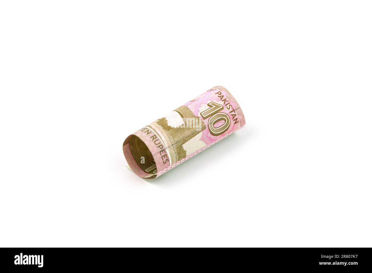 Währungsscheine in pakistanischen Rupien - 10 Rupien weisen einen isolierten weißen Hintergrund auf. Stockfoto
