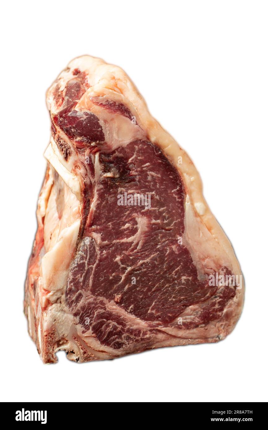 Großes rohes Rindfleisch-T-Bone-Steak. Kalbfleisch-Cowboy-Steak auf Rippenauge isoliert auf weißem Hintergrund. Weicher T-Bone mit Prime-Cut-Effekt Stockfoto