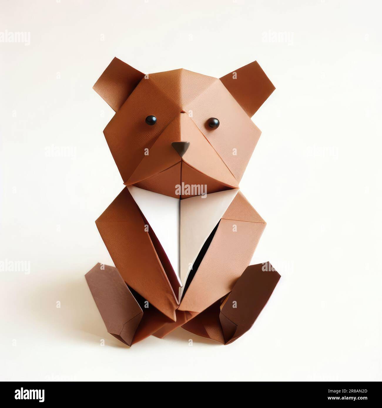 Gefaltete Origami-Teddy-Bär-Papierkunst Im Sitzen Stockfoto