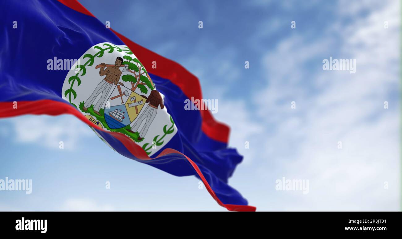 Die Nationalflagge von Belize winkt im Wind an klaren Tagen. Blaues Feld, rote Streifen oben und unten, weiße Scheibe mit National Coat of Arms. 3D Abbildung Stockfoto