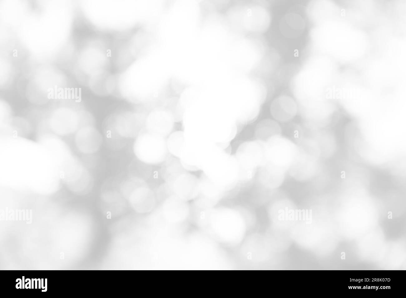 Unscharfe Darstellung des weißen Hintergrunds mit Bokeh-Effekt Stockfoto