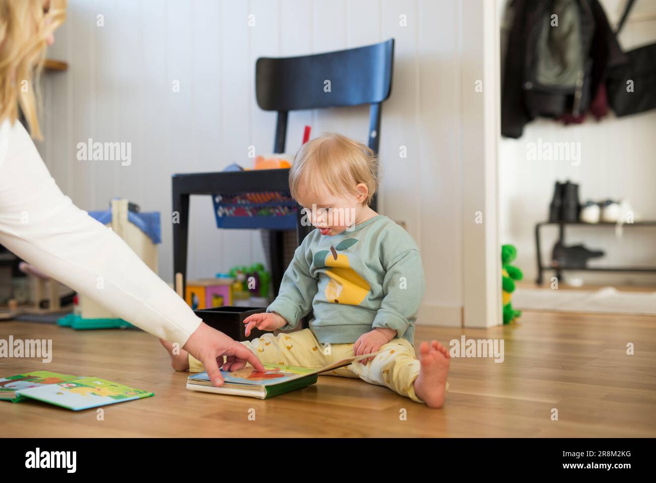 Mutter und Kleinkind mit Down-Syndrom Stockfoto