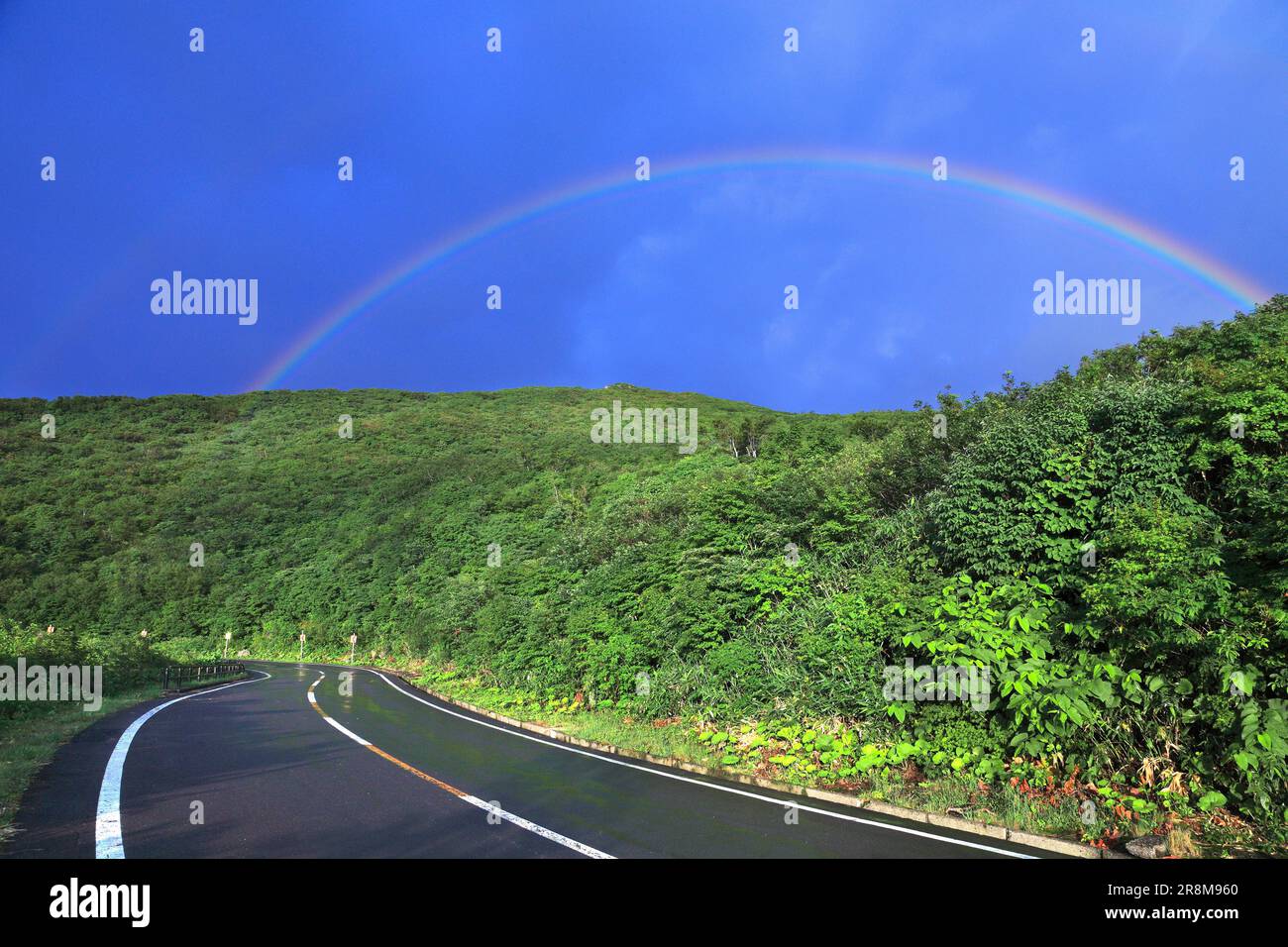 Regenbogen am Mt. Chokai und Chokai Blue Line Stockfoto