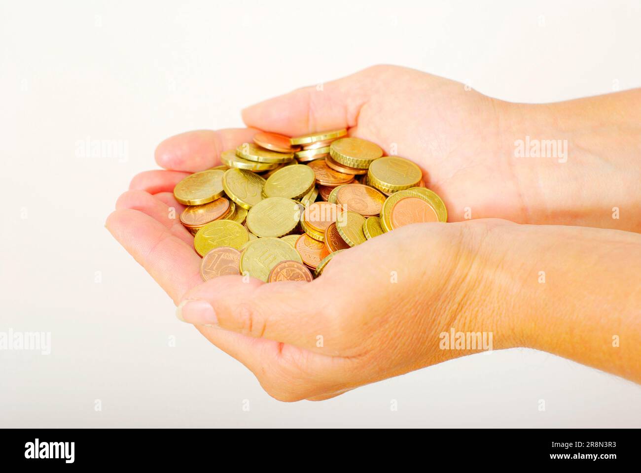 Hände mit Euromünzen, Wechselgeld Stockfoto