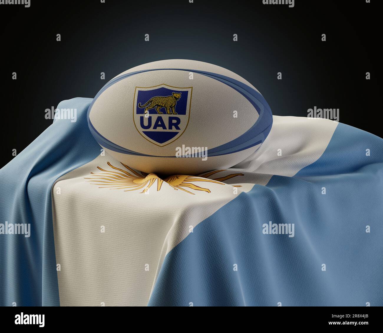 Eine 3D-Darstellung eines generischen Rugby-Balls mit dem Pumas Rugby-Logo auf einer drapierten argentinischen Nationalflagge – 4. Dezember 2022 in Bristol, Uni Stockfoto